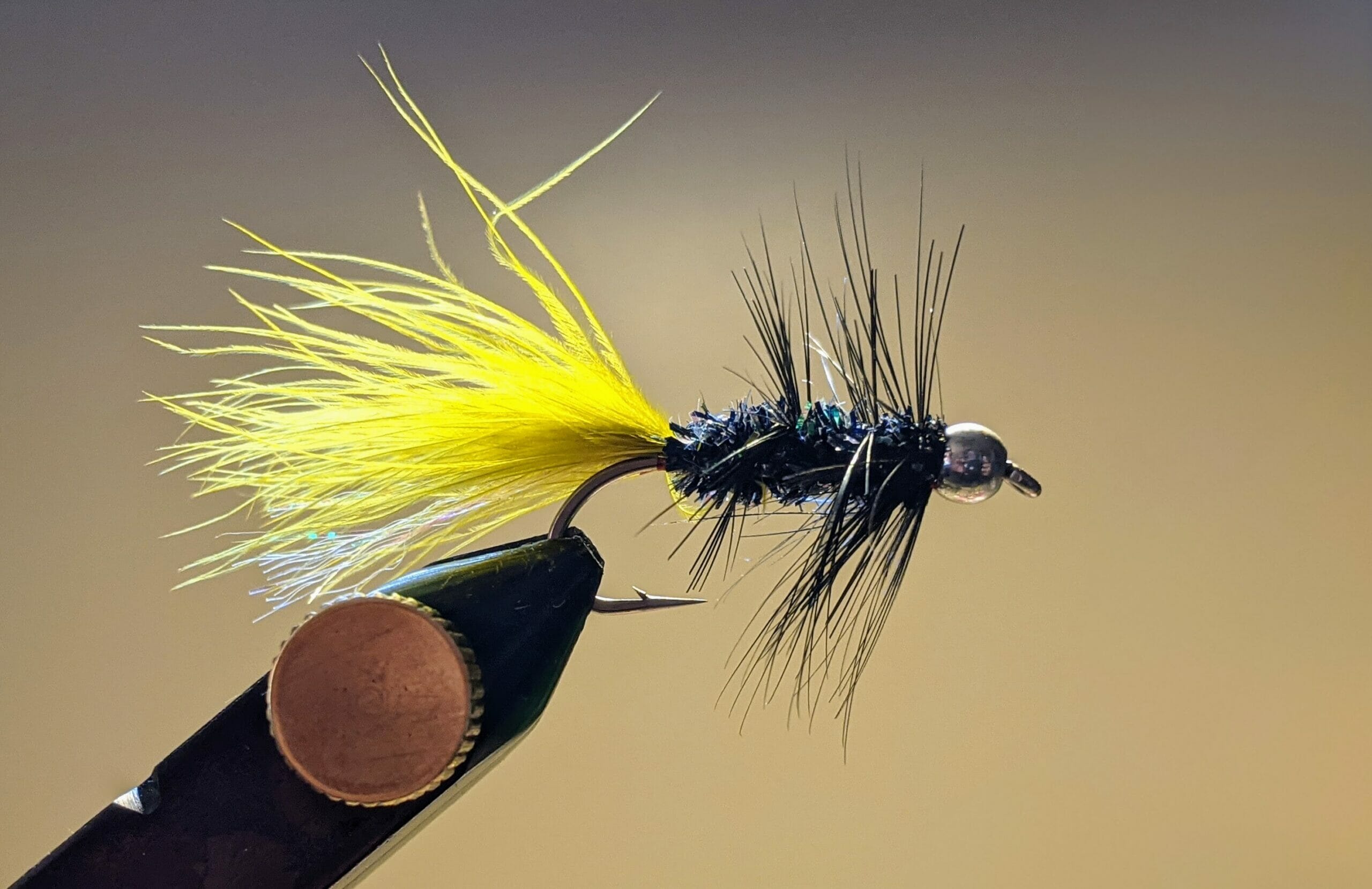 A Woolly Bugger in the vise.