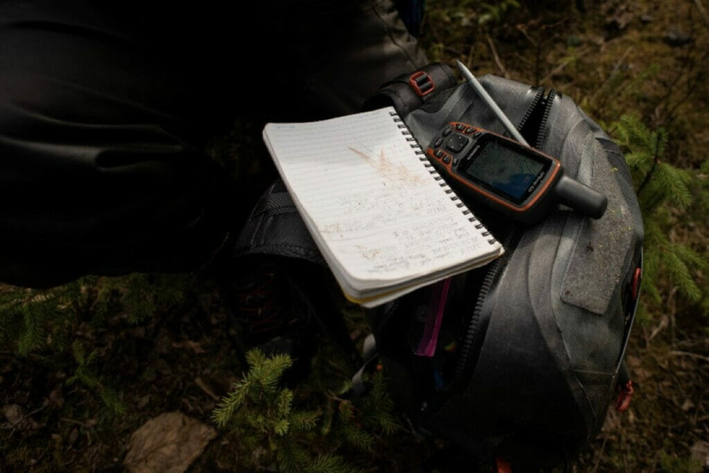 Notebook, backpack, and electronic GPS device